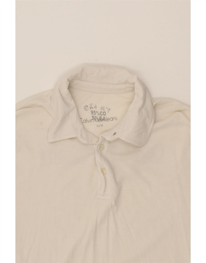 CALVIN KLEIN JEANS Mens Graphic Polo Shirt Medium White Cotton Vintage Calvin Klein Jeans and Second-Hand Calvin Klein Jeans from Messina Hembry 