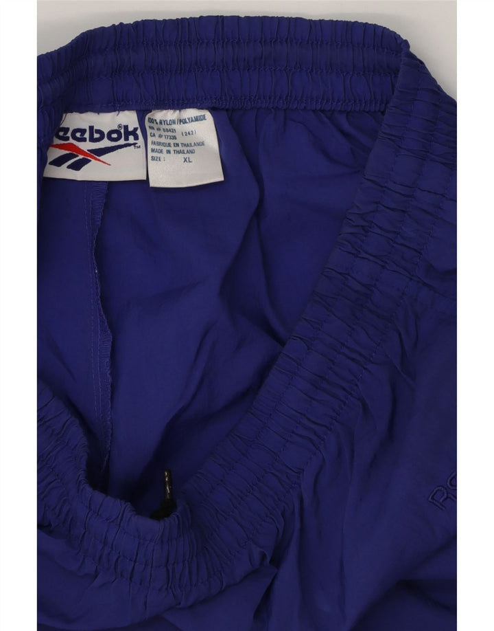 Pantaloni de trening pentru bărbați REEBOK Pantaloni de jogging XL Violet Poliester