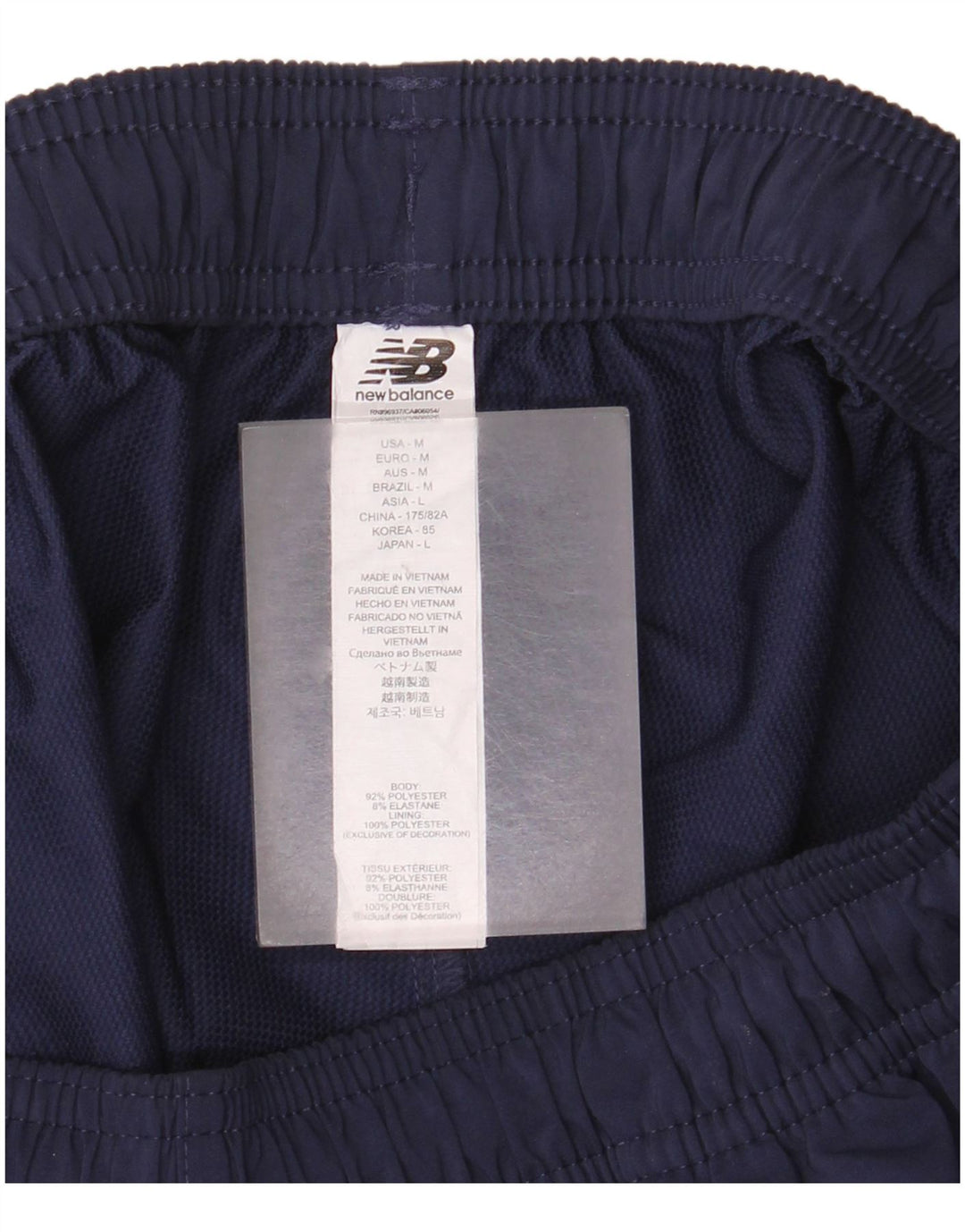 Pantaloni de trening New Balance pentru bărbați, poliester mediu albastru bleumarin
