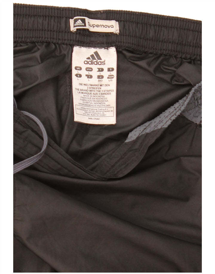 Pantaloni impermeabili pentru bărbați Adidas Supernova, mari, negru, poliester color bloc
