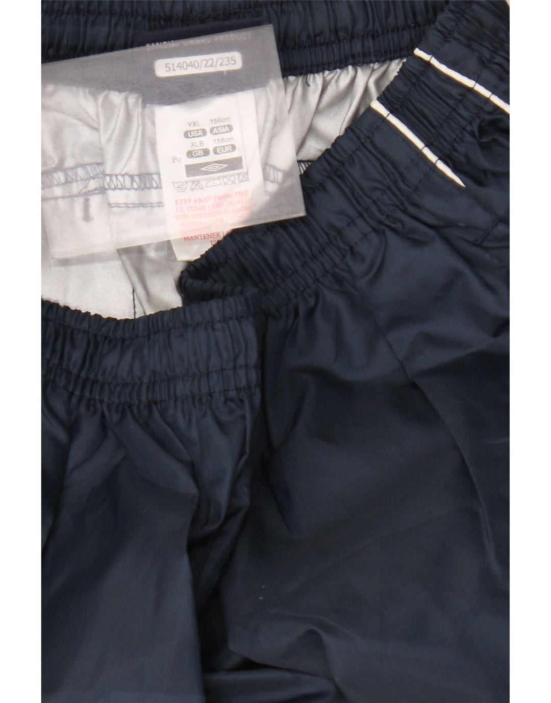 Pantaloni impermeabili pentru baieti Umbro 13-14 ani XL bleumarin poliester