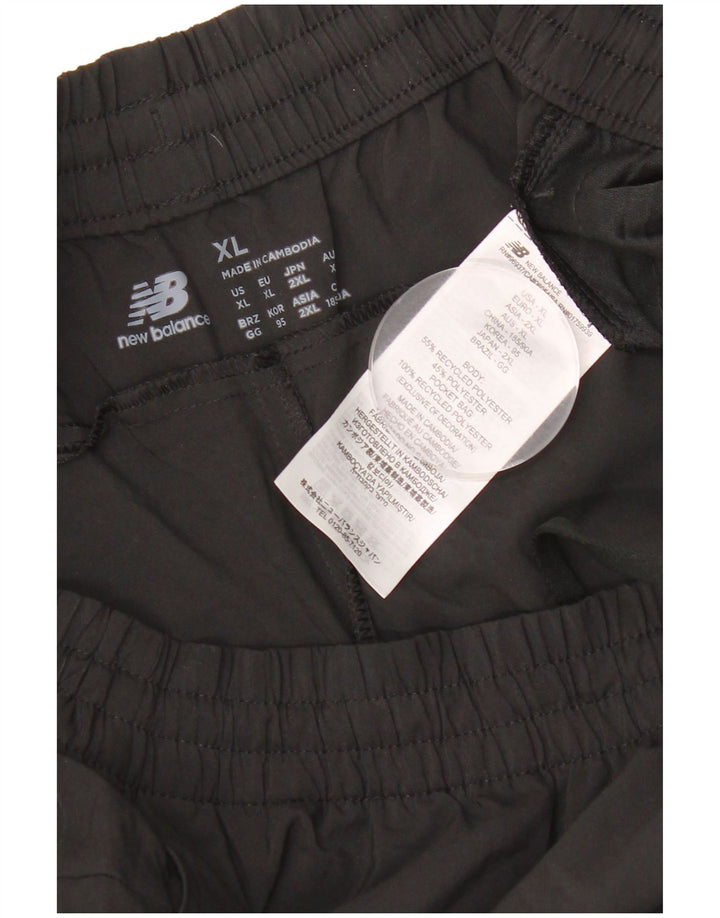 Pantaloni de trening pentru bărbați New Balance Pantaloni de jogging XL Poliester negru
