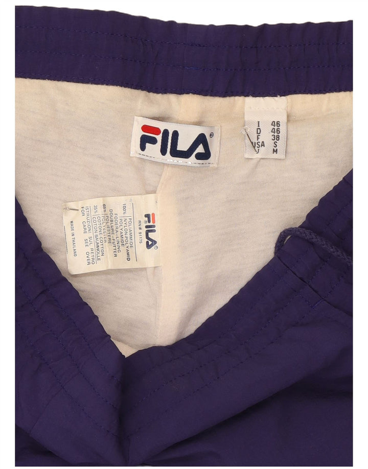 Pantaloni de trening Fila Bărbați Joggeri IT 46 Poliamidă Mov Mic