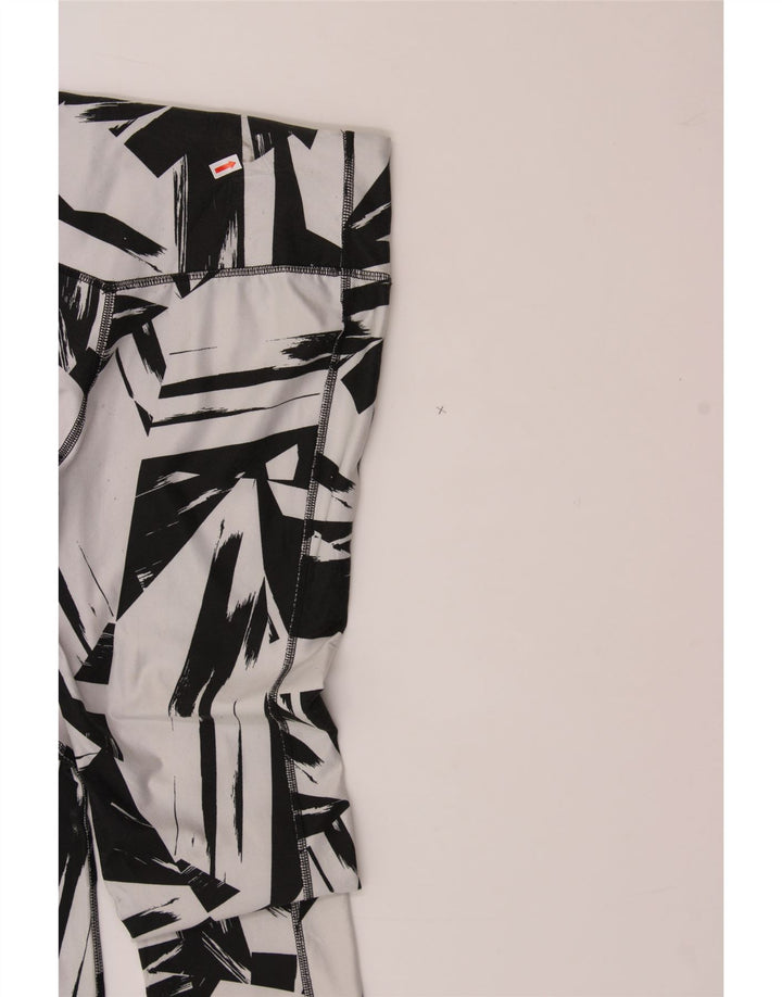 NIKE Womens Dri Fit Leggings UK 14 Medium  Black Geometric Polyester Vintage Nike and Second-Hand Nike from Messina Hembry 