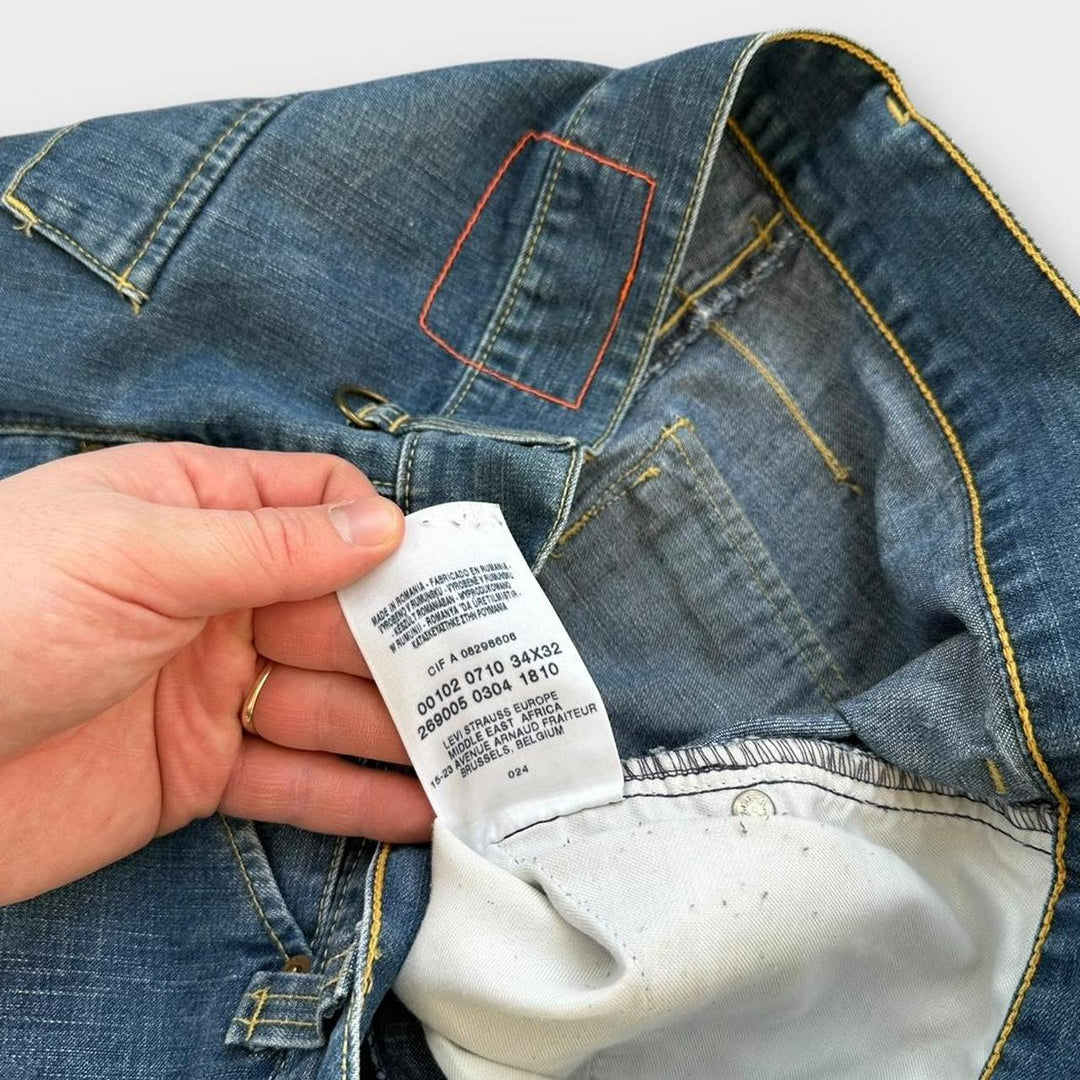 Blugi largi Levi’s răsuciți - 34 talie