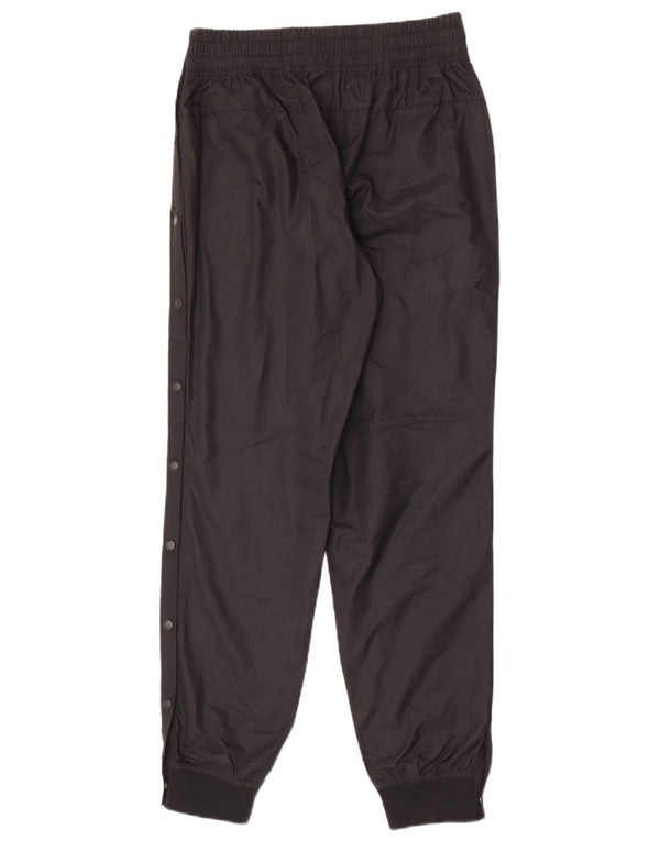 Pantaloni de jogging pentru femei Nike impermeabili UK 12 Poliester mediu negru