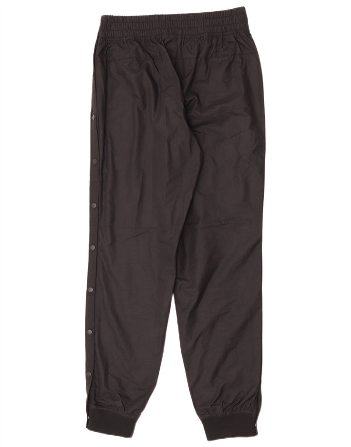 Pantaloni de jogging pentru femei Nike impermeabili UK 12 Poliester mediu negru
