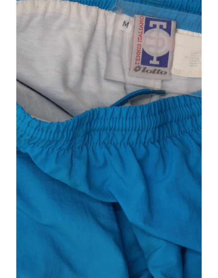 Pantaloni de trening pentru bărbați LOTTO Pantaloni de jogging Poliester albastru mediu