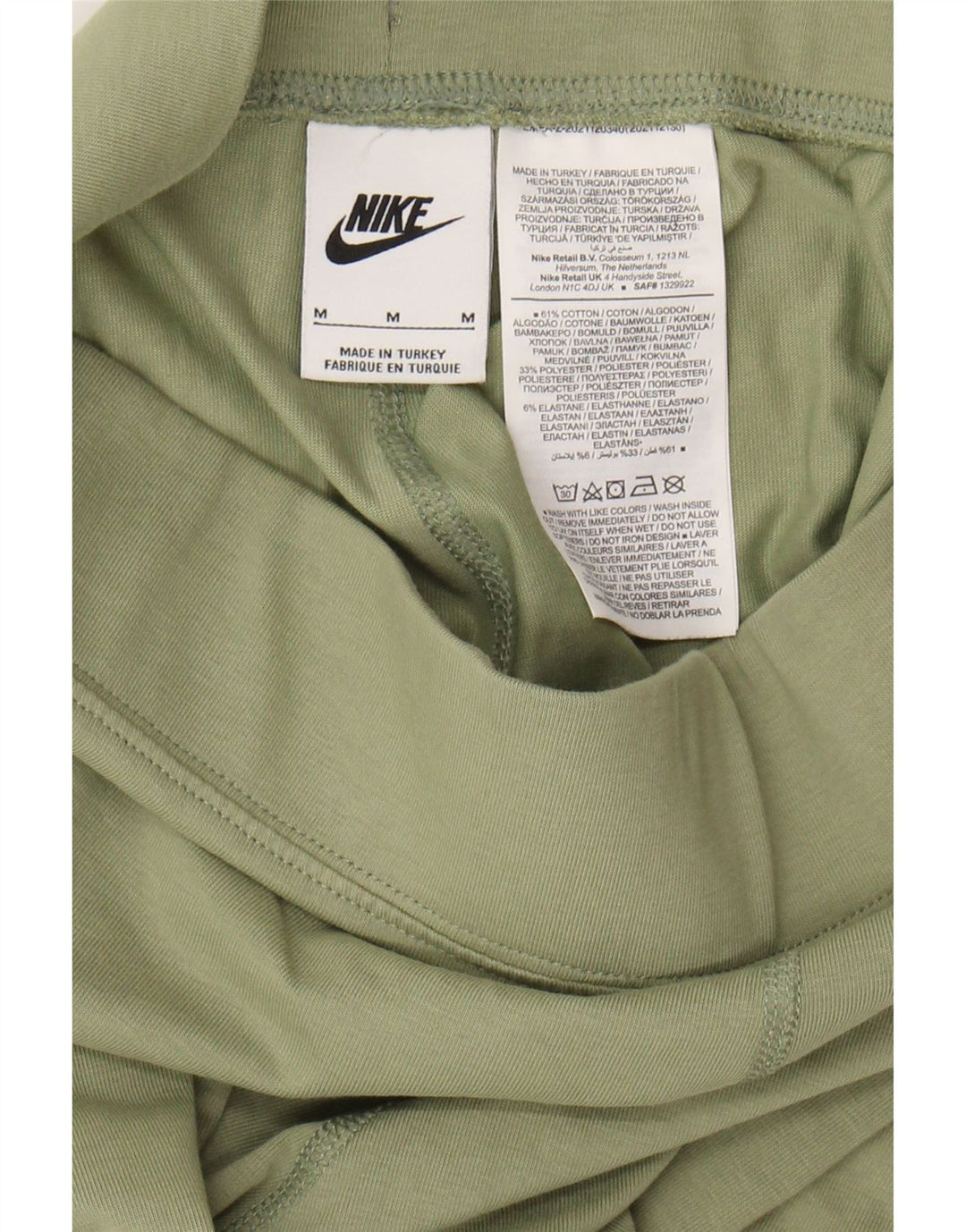 NIKE Womens Graphic Leggings UK 12 Medium  Green Cotton
