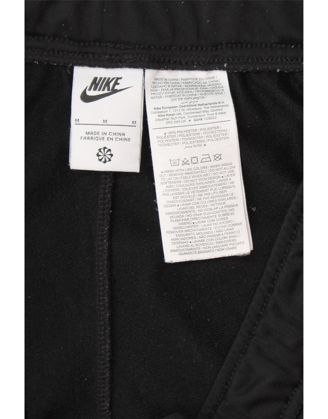 NIKE Mens Tracksuit Trousers Joggers Medium  Black Polyester Vintage Nike and Second-Hand Nike from Messina Hembry 
