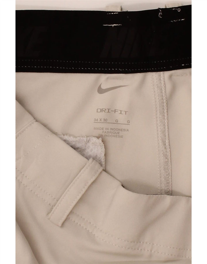 NIKE Womens Dri Fit Straight Chino Trousers W34 L30 Beige Polyester Vintage Nike and Second-Hand Nike from Messina Hembry 