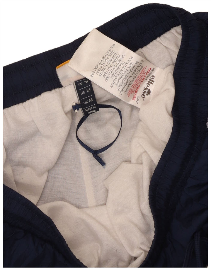 Pantaloni de trening pentru bărbați Ellesse Pantaloni de jogging, mijlocii, bleumarin, color block