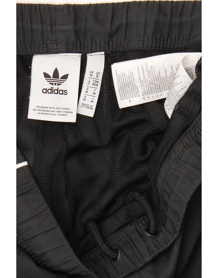 Pantaloni de trening pentru bărbați Adidas Pantaloni de jogging Mediu Negru Poliester color bloc