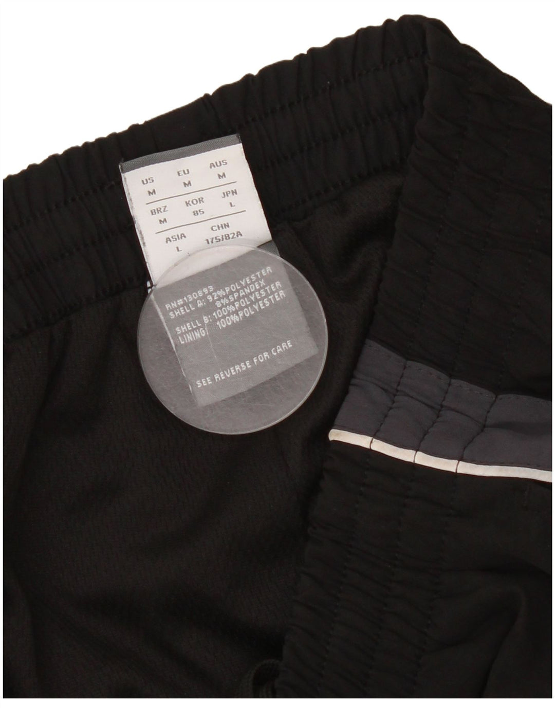 Pantaloni de trening pentru bărbați New Balance Pantaloni de jogging Medium Black Colorblock