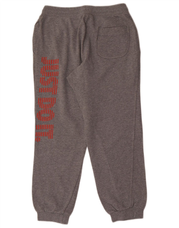Pantaloni de trening grafic Nike pentru bărbați Joggeri din bumbac gri mediu