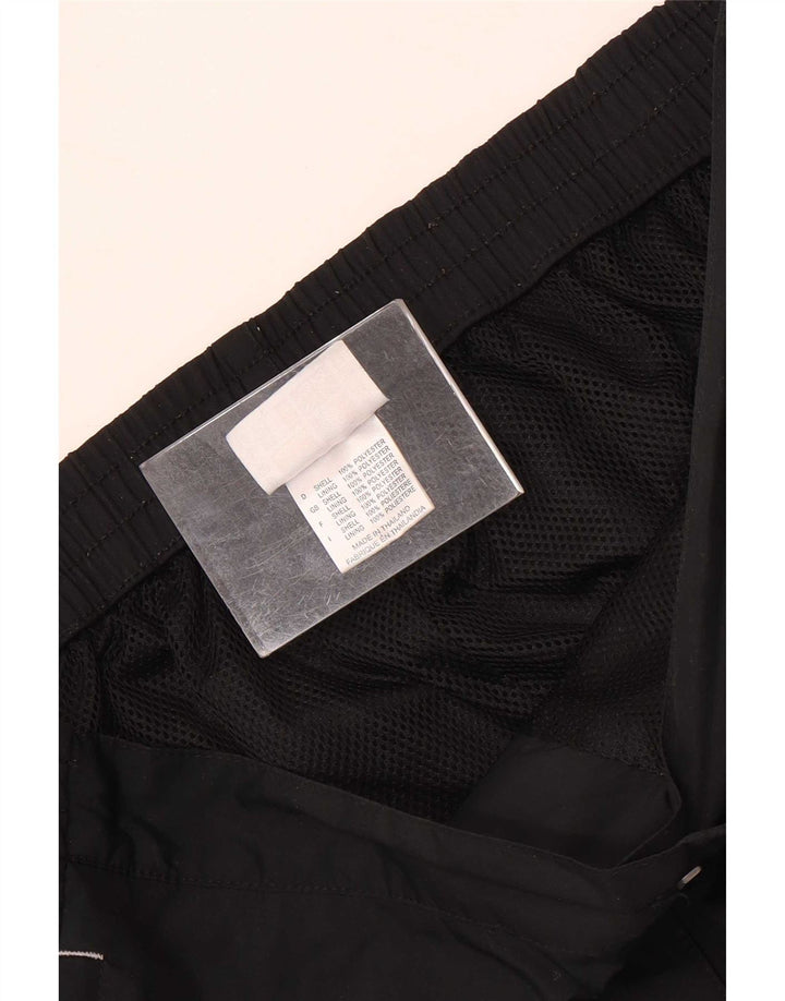 Pantaloni impermeabili pentru femei Asics UK 14 Poliester mediu negru