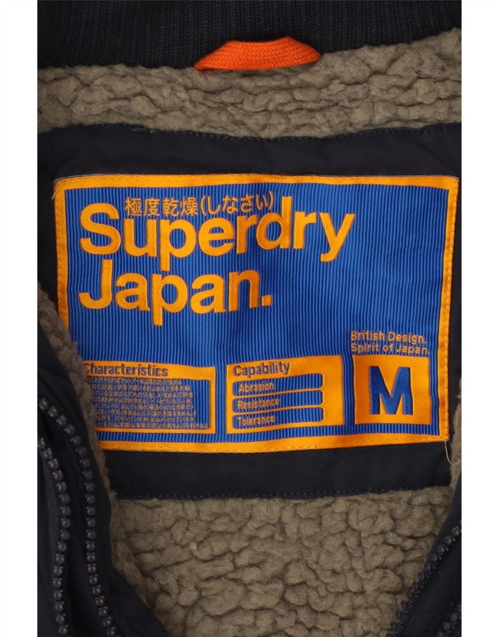 SUPERDRY Jachetă de vânt cu glugă pentru femei UK 14 Poliester mediu albastru bleumarin