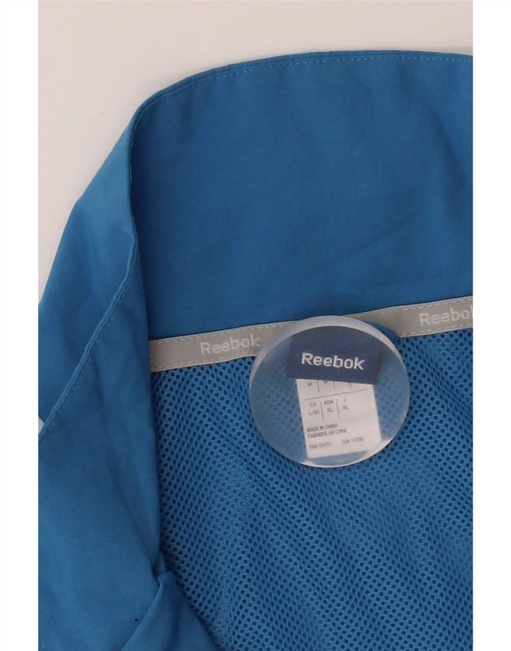 REEBOK Mens Tracksuit Top Jacket Medium Blue Colourblock Polyester Vintage Reebok and Second-Hand Reebok from Messina Hembry 