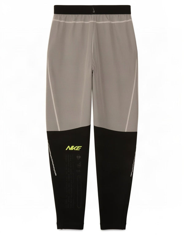 Pantaloni de trening Nike Dri Fit Graphic pentru bărbați, gri mici