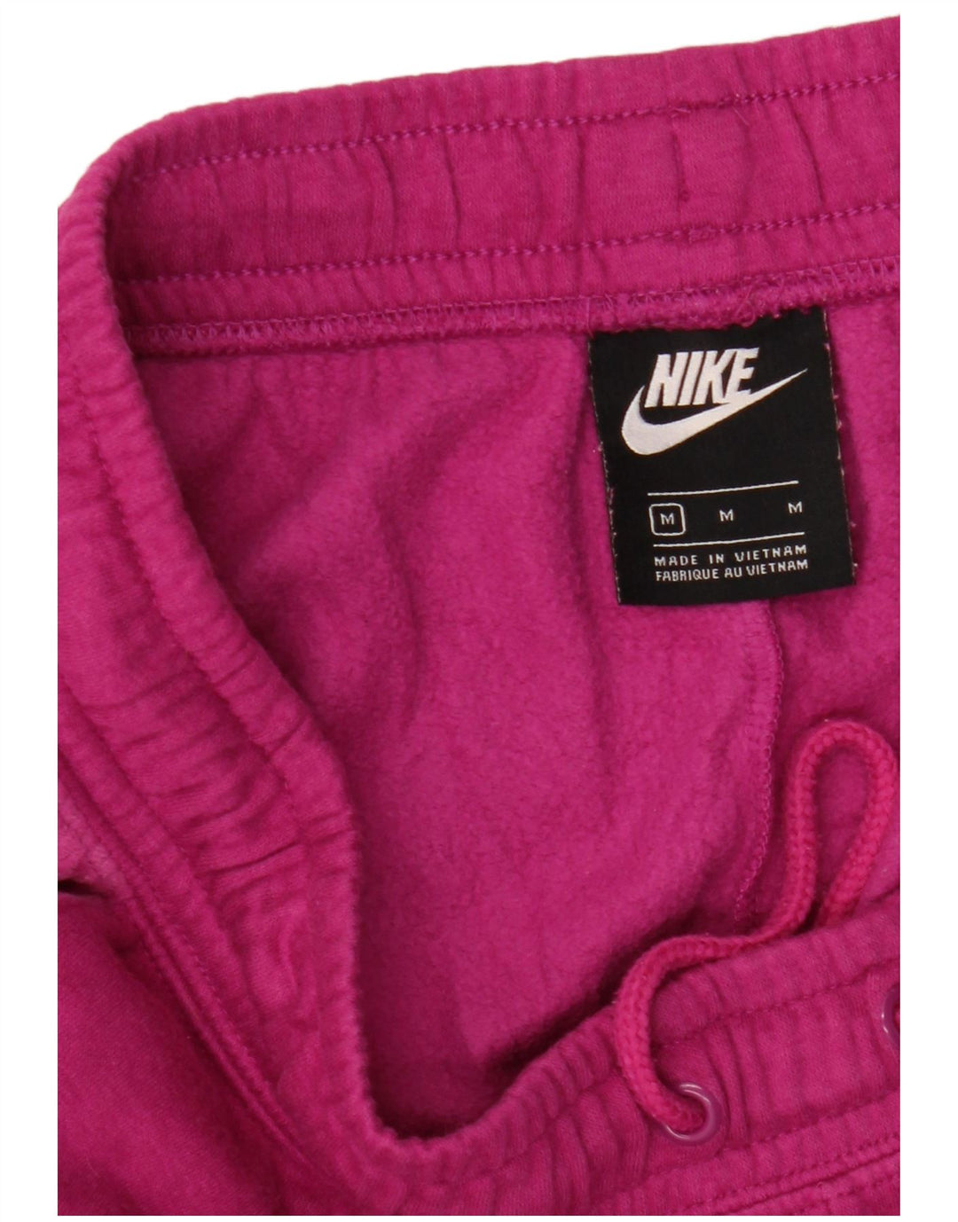 Pantaloni de trening pentru femei Nike Pantaloni de jogging UK 14 Roz mediu