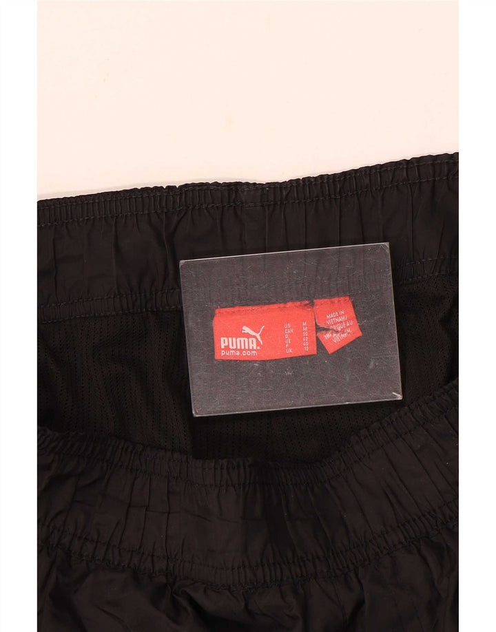 Pantaloni impermeabili pentru femei Puma UK 12 Medium Black