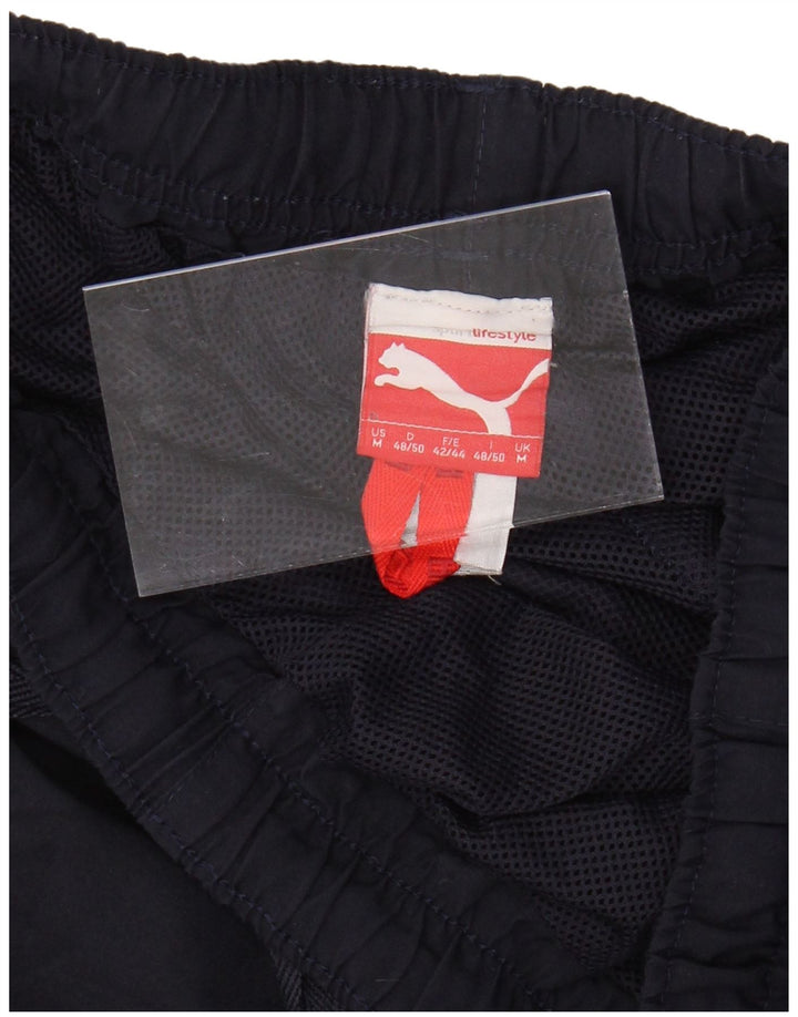 Pantaloni de trening grafic pentru bărbați PUMA Pantaloni de jogging Medium Bleumarin
