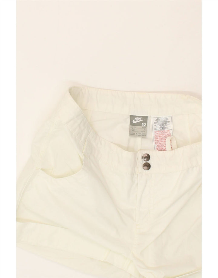 NIKE Womens Casual Shorts UK 10 Small W32 White Polyester Vintage Nike and Second-Hand Nike from Messina Hembry 