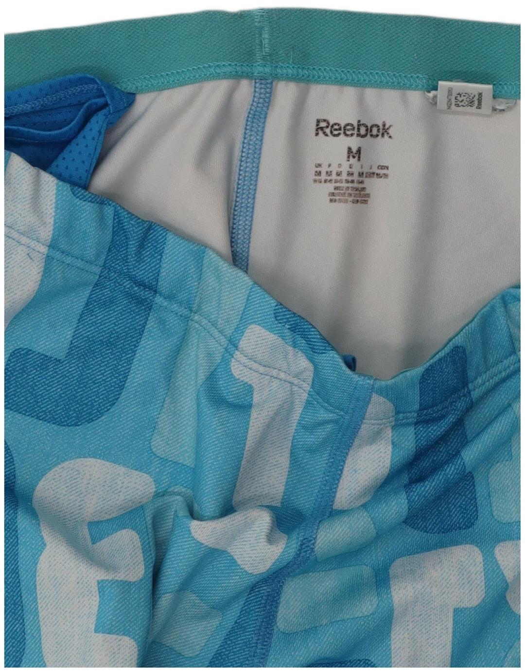 Pantaloni de trening grafic REEBOK pentru femei UK 12 Medium Blue Colorblock