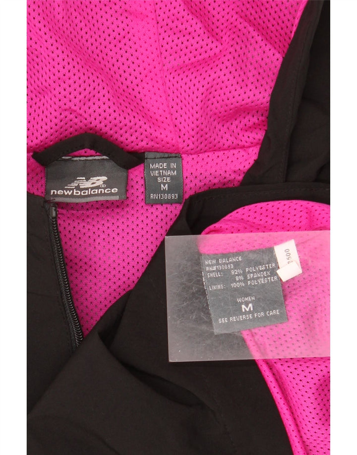 Pelernă de ploaie cu glugă pentru femei New Balance UK 14 Poliester mediu negru