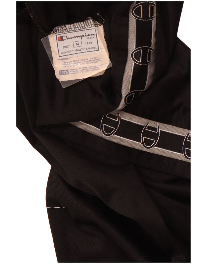 Pantaloni de trening grafic pentru femei CHAMPION UK 12 Poliester mediu negru