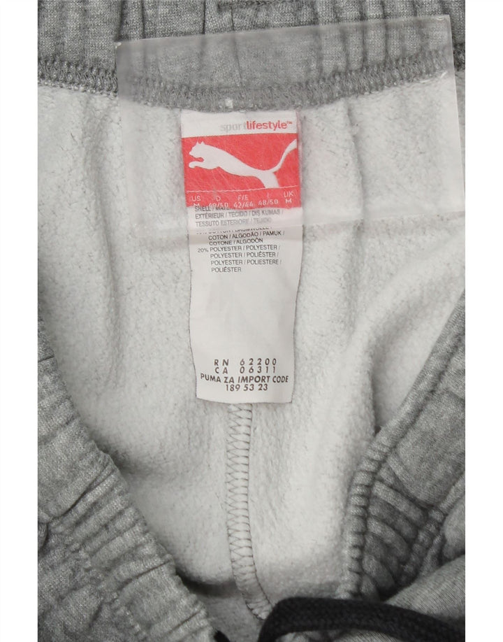 Pantaloni de trening cu grafică Puma pentru bărbați Joggeri din bumbac gri mediu