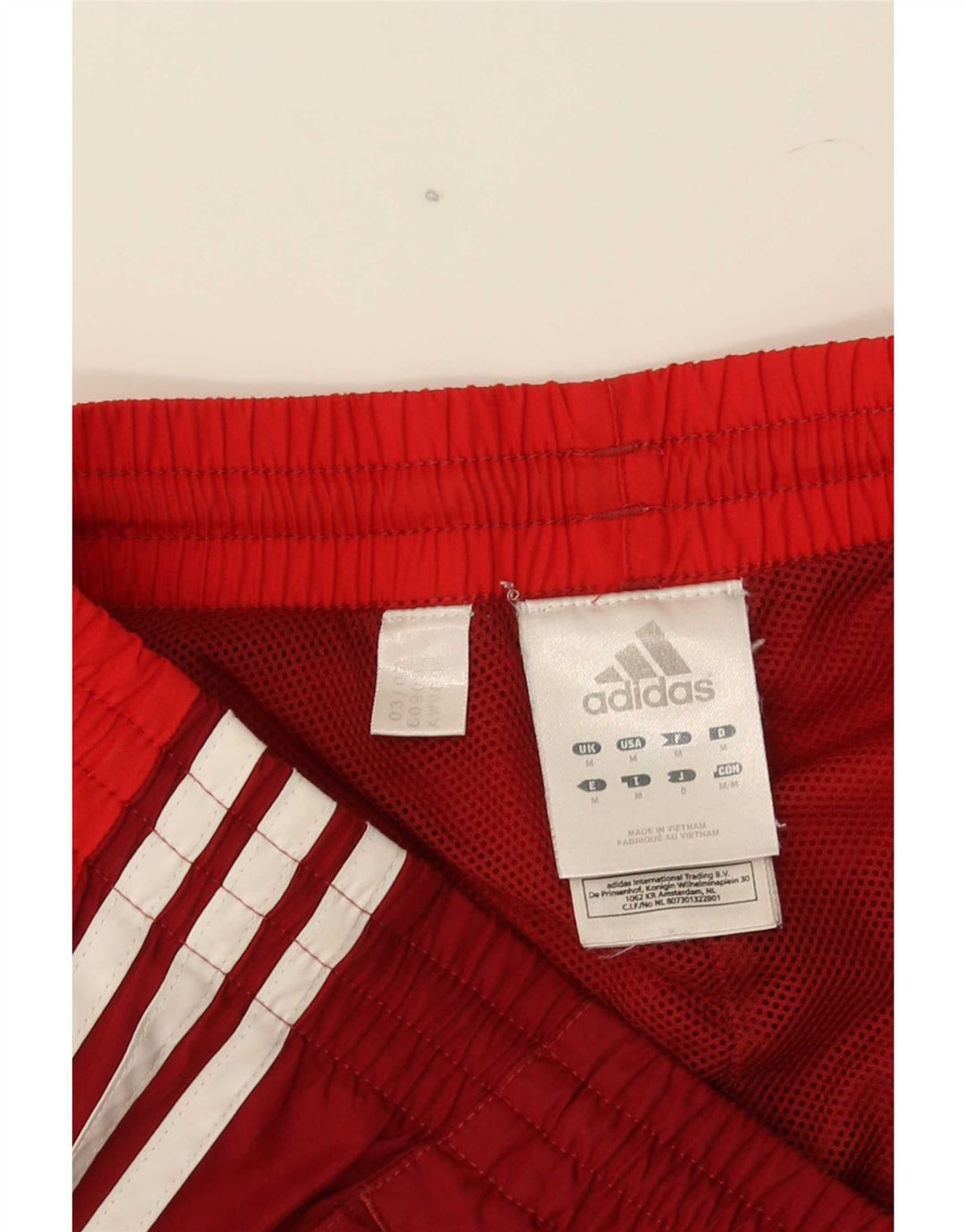 Pantaloni de trening pentru bărbați Adidas Pantaloni de jogging Poliester roșu mediu