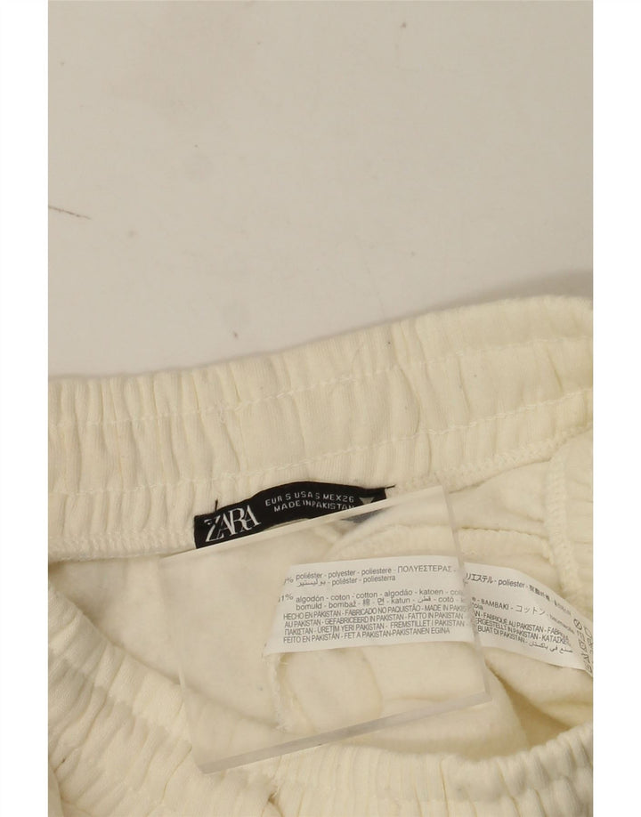 Pantaloni de trening Zara Femei Joggeri UK 8 Poliester alb catifelat