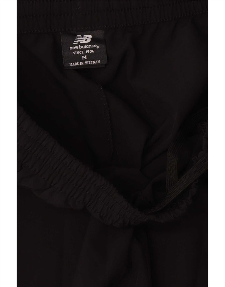 Pantaloni de trening New Balance pentru femei UK 14 Poliester mediu negru