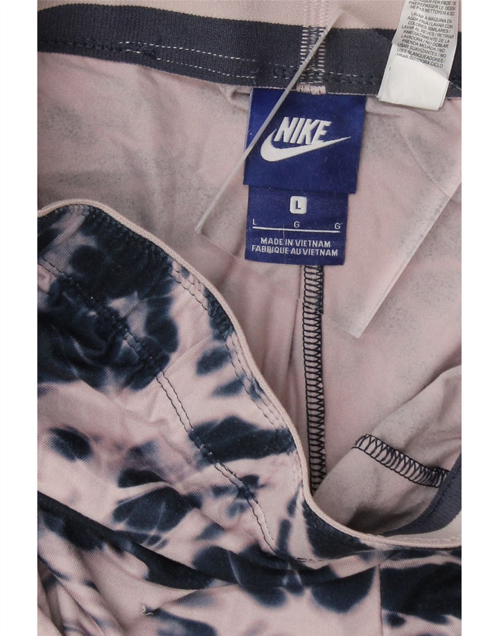 NIKE Womens Tracksuit Trousers UK 14 Large Pink Tie Dye Polyester Vintage Nike and Second-Hand Nike from Messina Hembry 