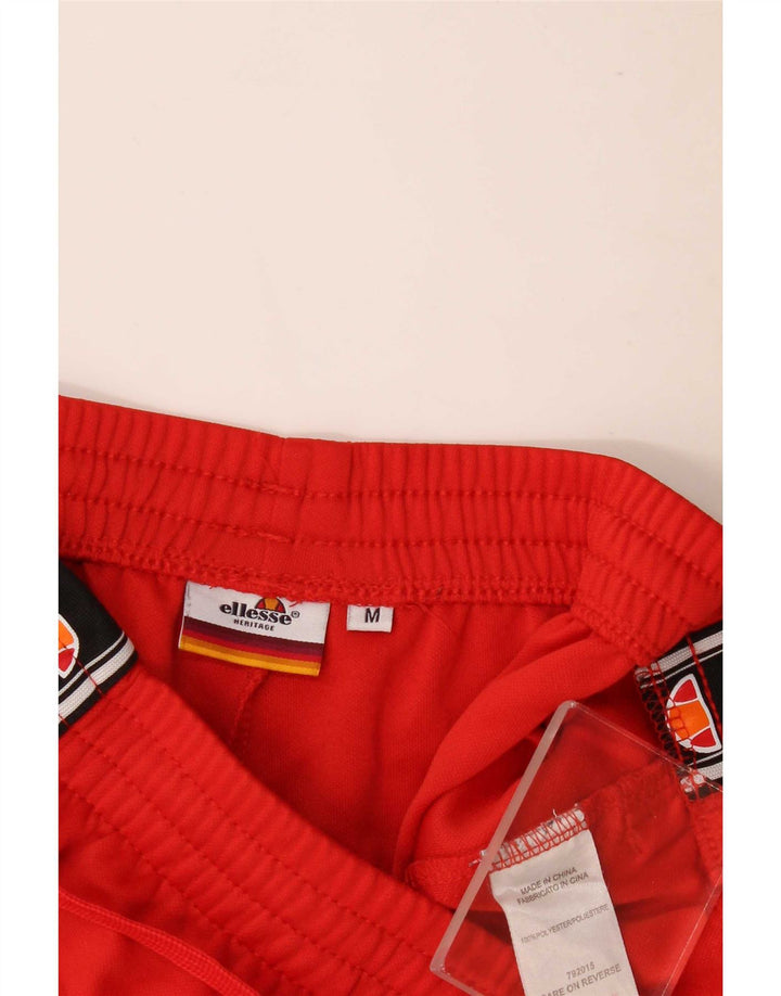 Pantaloni de trening cu grafică pentru bărbați Ellesse, roșu mediu, poliester color bloc
