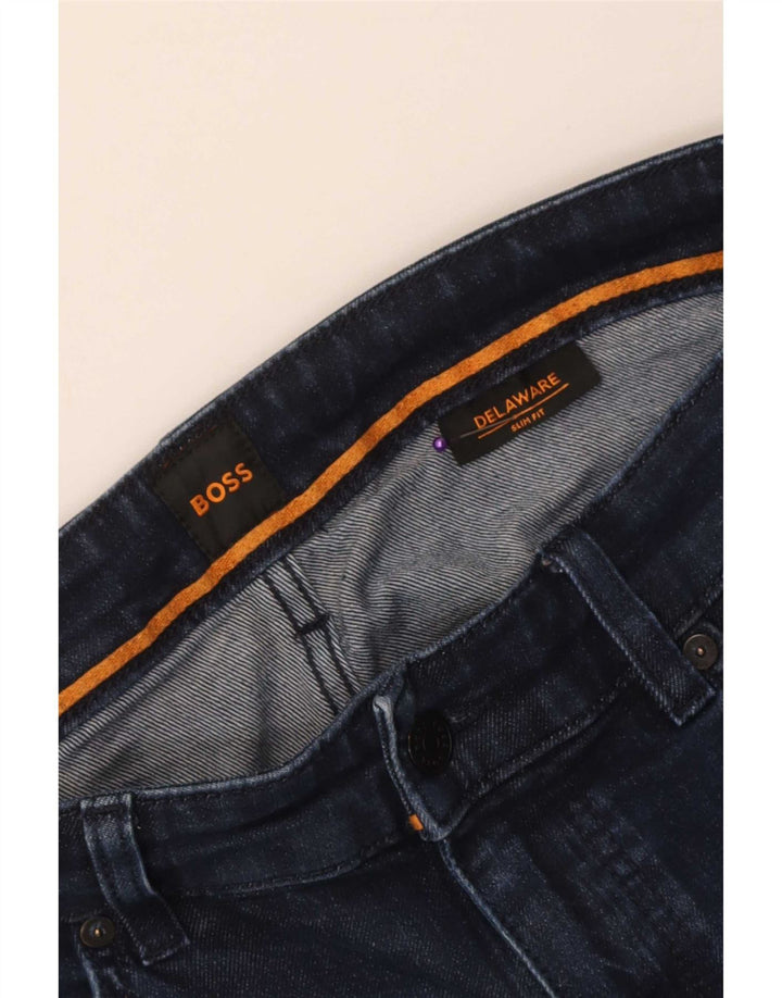 Blugi pentru bărbați Hugo Boss Delaware Slim W34 L31 bleumarin