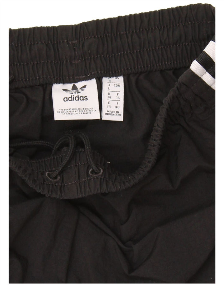 Pantaloni de trening cu grafic pentru femei Adidas Joggeri UK 8 Poliester negru mic