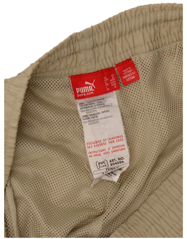 Pantaloni de trening PUMA Graphic Capri pentru bărbați, poliester mediu bej